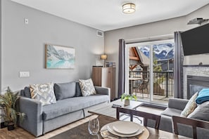 TV, fireplace - 3 Sisters Mtn View | Pool w/slide | Hot Tub | BBQ (Canmore)