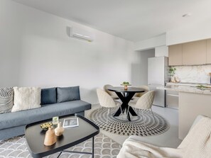 Apartment, 1 Bedroom, Balcony, City View | Living room