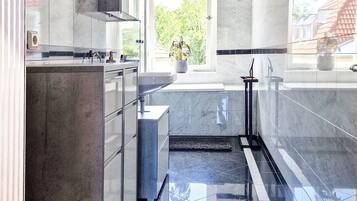 Hair dryer, towels, soap, shampoo