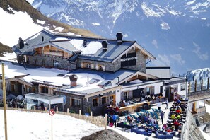 A hotel with a stone facade, wooden interior, and a sign reading "WEDELHÖTTE". - Chalet in Fugen Near Spieljochbahn (Fuegen)