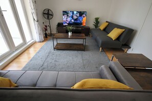 Ferienhaus | Wohnbereich | Fernseher