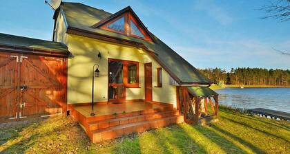 Holiday Home by Lake Rosnowskie With Boat