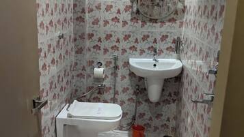 Shower, rainfall showerhead, towels, soap
