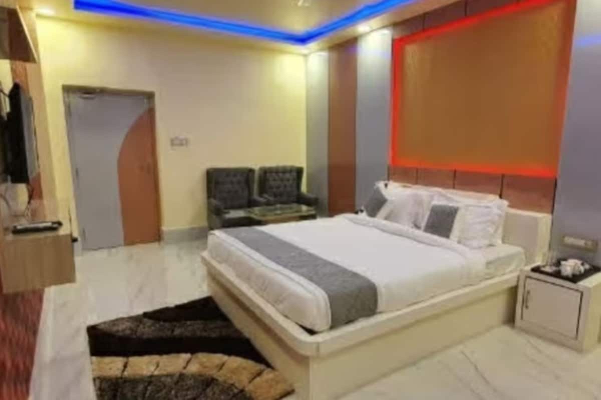 Habitación Deluxe, vista a la ciudad | Wifi gratis y ropa de cama
