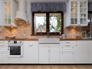 Apartment | Private kitchen | Electric kettle, toaster, highchair