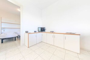 Bangalô | Cozinha privada | Cadeirão de bebê