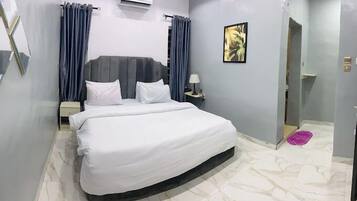 Deluxe Room, Balcony, City View | Desk, laptop workspace, free WiFi