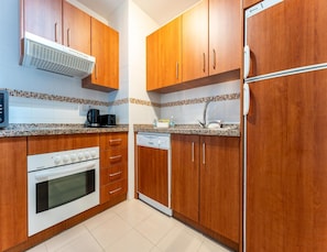 Private kitchen - Faro's Playa Marina Apartment (Mijas)