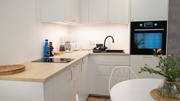 Apartment | Private kitchen | Electric kettle, toaster, high chair