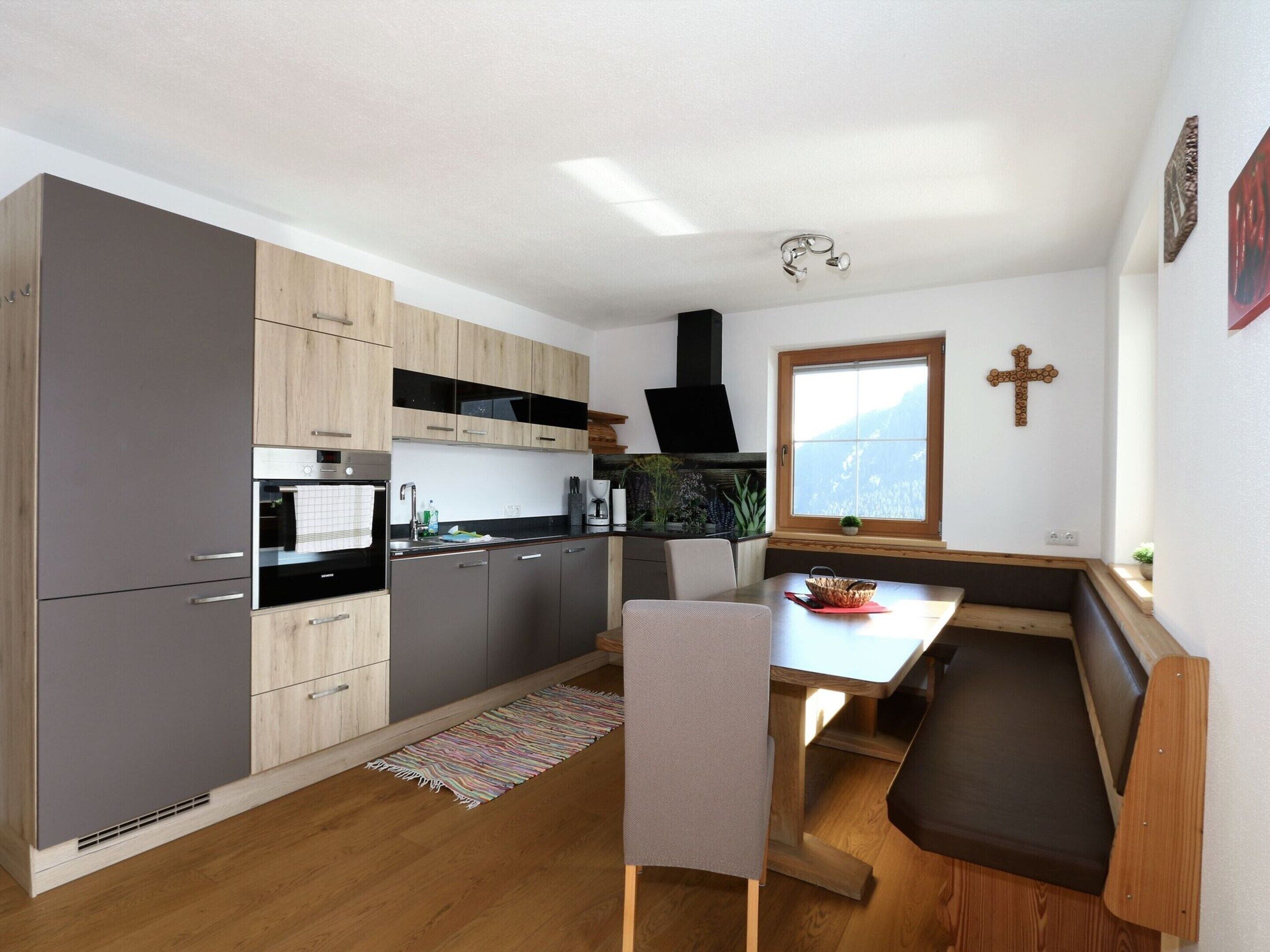 Apartamento | Cozinha privada | Cadeirão de bebê