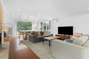TV, fireplace, books, stereo