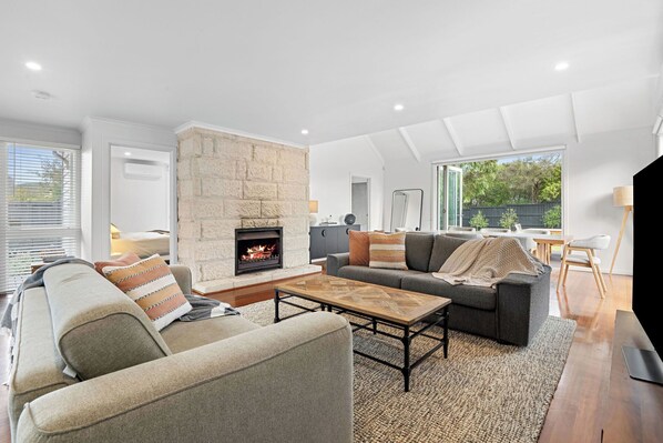 TV, fireplace, books, stereo