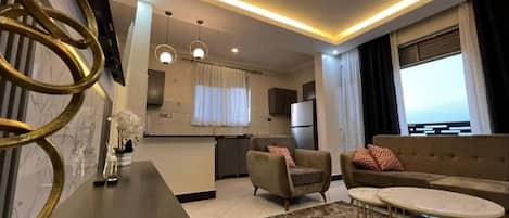 Lyxlägenhet - balkong - utsikt mot staden | Vardagsrum | Platt-tv