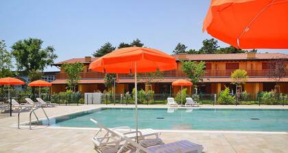 Pure House Cottages in the Villaggio Tamerici Holiday Complex in Lignano Sabbiad