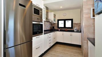 Apartamento | Cocina privada | Trona infantil