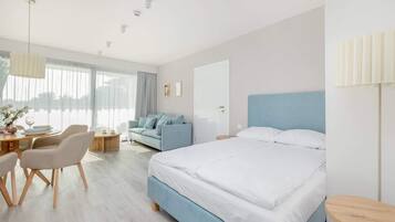 Iron/ironing board, travel crib, WiFi, bed sheets