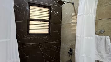 Superior Double Room | Bathroom | Shower, free toiletries, slippers, towels