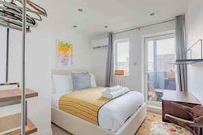 2 habitaciones, tabla de planchar con plancha, internet y ropa de cama
