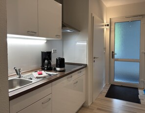 Apartment | Private kitchen | Electric kettle, toaster, highchair