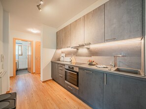 Apartment | Private kitchen | Electric kettle, highchair