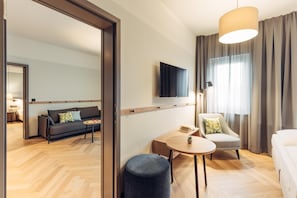 1 dormitori, roba de llit hipoal·lergògena i caixa forta a l'habitació