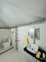 Shower, free toiletries, hair dryer, slippers