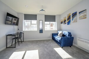 Superior Studio | Living area | 50-inch Smart TV with digital channels