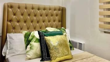 1 dormitorio, tabla de planchar con plancha, wifi y ropa de cama