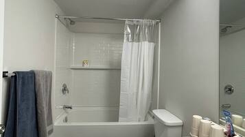 Hair dryer, towels, soap, shampoo