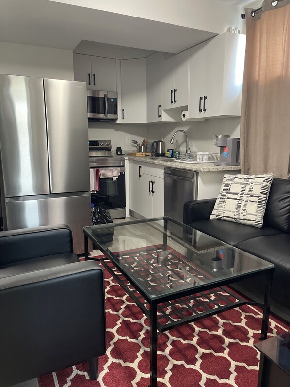 Fridge, microwave, oven, stovetop - The Fortress safe haven. Affordable accommodation on Westside (Saskatoon)