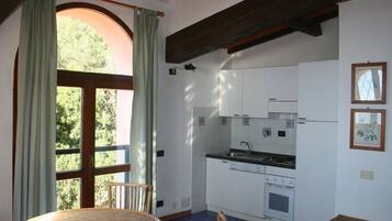 Apartamento | Cocina privada | Trona infantil