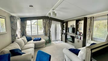Cabin | Living area | TV, fireplace