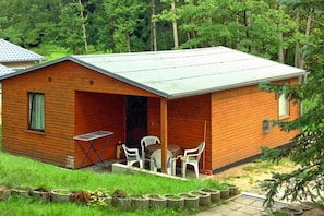 Bungalow | Restaurante al aire libre
