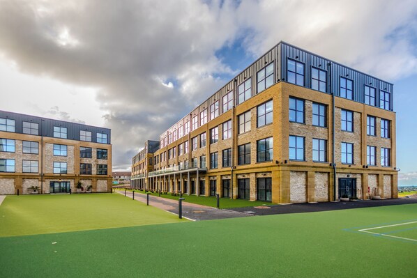 A modern building with multiple floors, large windows, and a flat roof. - THE SPACE TO STAY APARTHOTEL (St. Andrews)