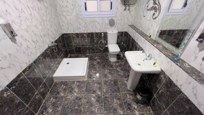 Basic Triple Room | Bathroom | Shower, slippers, towels, soap - Alaska Pyramids View (Giza)