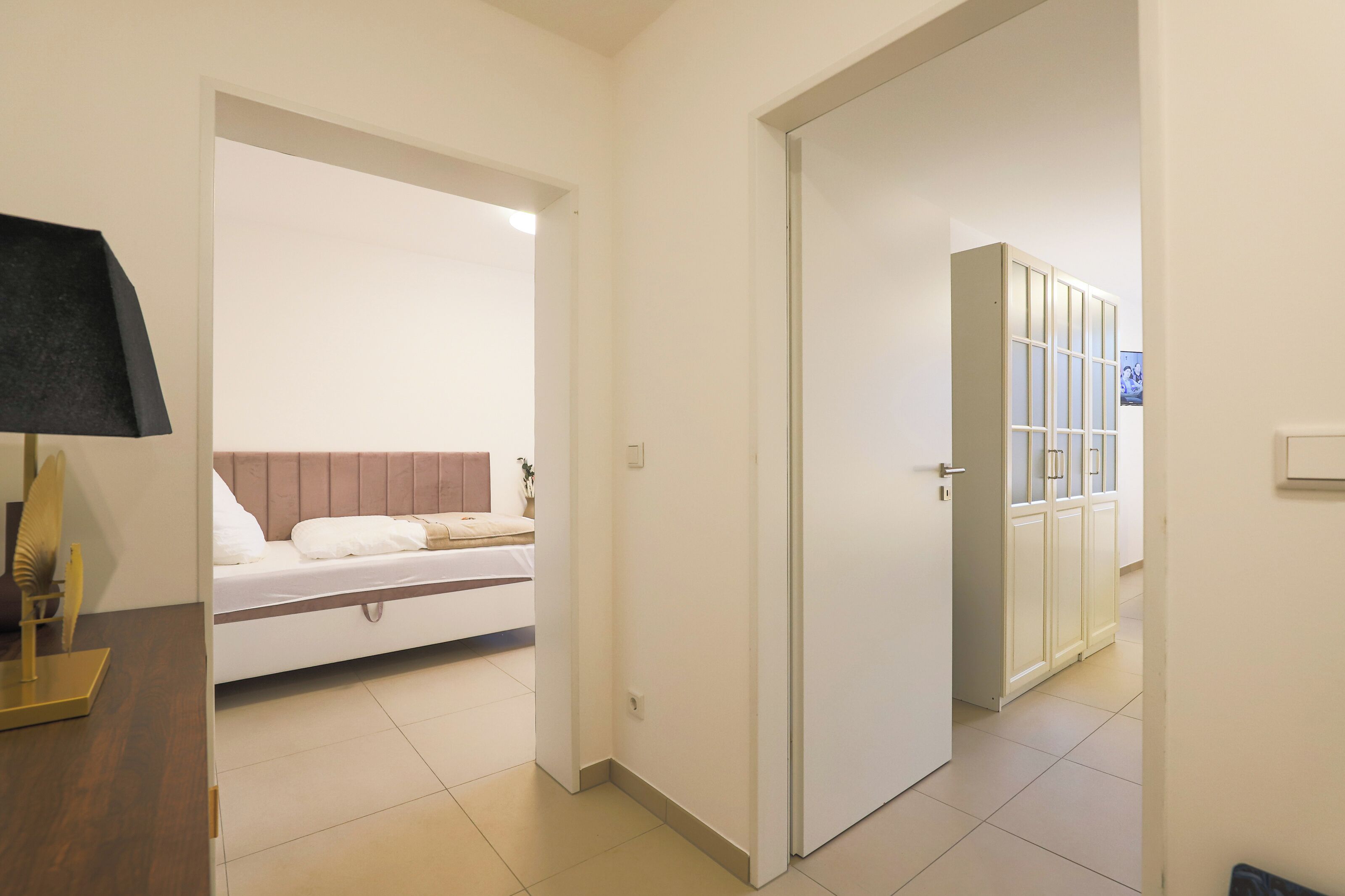 2 bedrooms, desk, iron/ironing board, travel crib