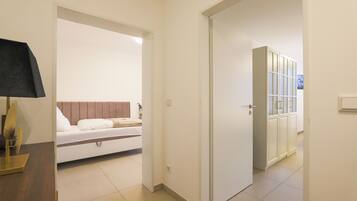 2 bedrooms, desk, iron/ironing board, travel crib