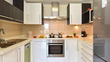 Casa | Cocina privada | Tetera eléctrica, tostadora y periquera