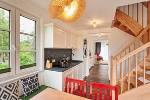 Appartement | Cuisine privée | Chaise haute