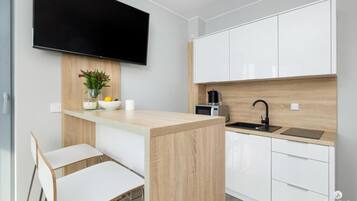 Apartment | Private kitchen | Electric kettle, high chair