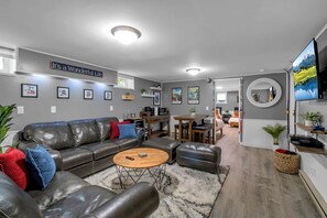 TV, fireplace, table football - Gondola House | Hot tub, Arcade, Walkable Getaway, Fun Central! Game Room, Hot Tub, Steps to Village... (Ellicottville)