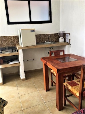 Chambre Triple Supérieure | Cuisine privée