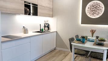 Apartment | Private kitchen | Electric kettle, high chair