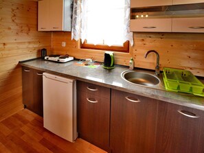 Private kitchen - Comfortable Holiday Homes With Terraces, Pool (Postomino)