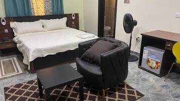 Economy Room, Balcony, City View | Desk, laptop workspace, free WiFi