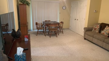Comfort Suite | Living area | 32-inch Smart TV with cable channels, Netflix, Hulu