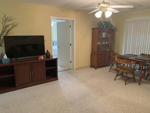 Comfort Suite | Living area | 32-inch Smart TV with cable channels, Netflix, Hulu - Camelot Village LLC (Harlingen)