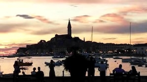 A waterfront view with a prominent building and boats. - Villa in Rovinj Near Beach & Old Town (Rovinj)
