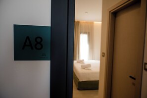 Deluxe Double Room, Balcony, Courtyard View | Egyptian cotton sheets, premium bedding, pillowtop beds, in-room safe - Ocean 11 Hotel (Skiathos)