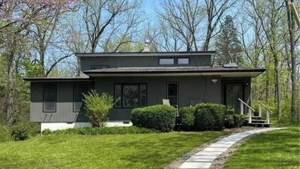 A modern two-story house with a stone pathway leading to the front door. - Spacious 4 bdrm home, Close to Lake, Wine, Downtown, Kid Friendly, Self Checkin (Geneva)